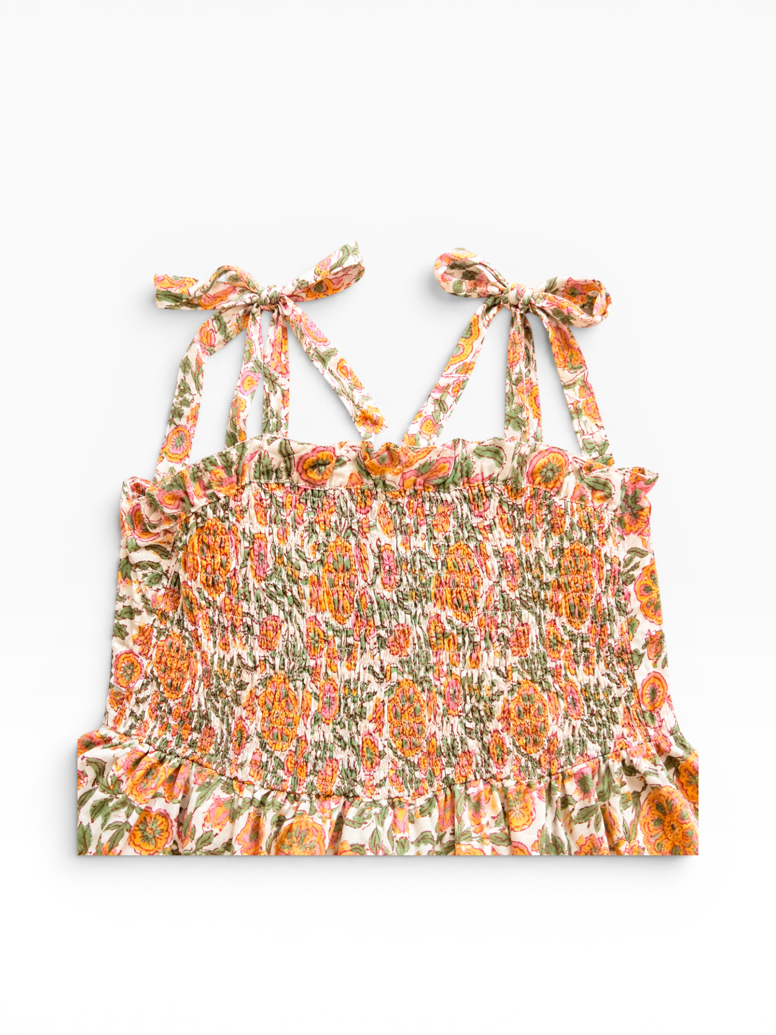 Floral patterned top with tie straps on a white background