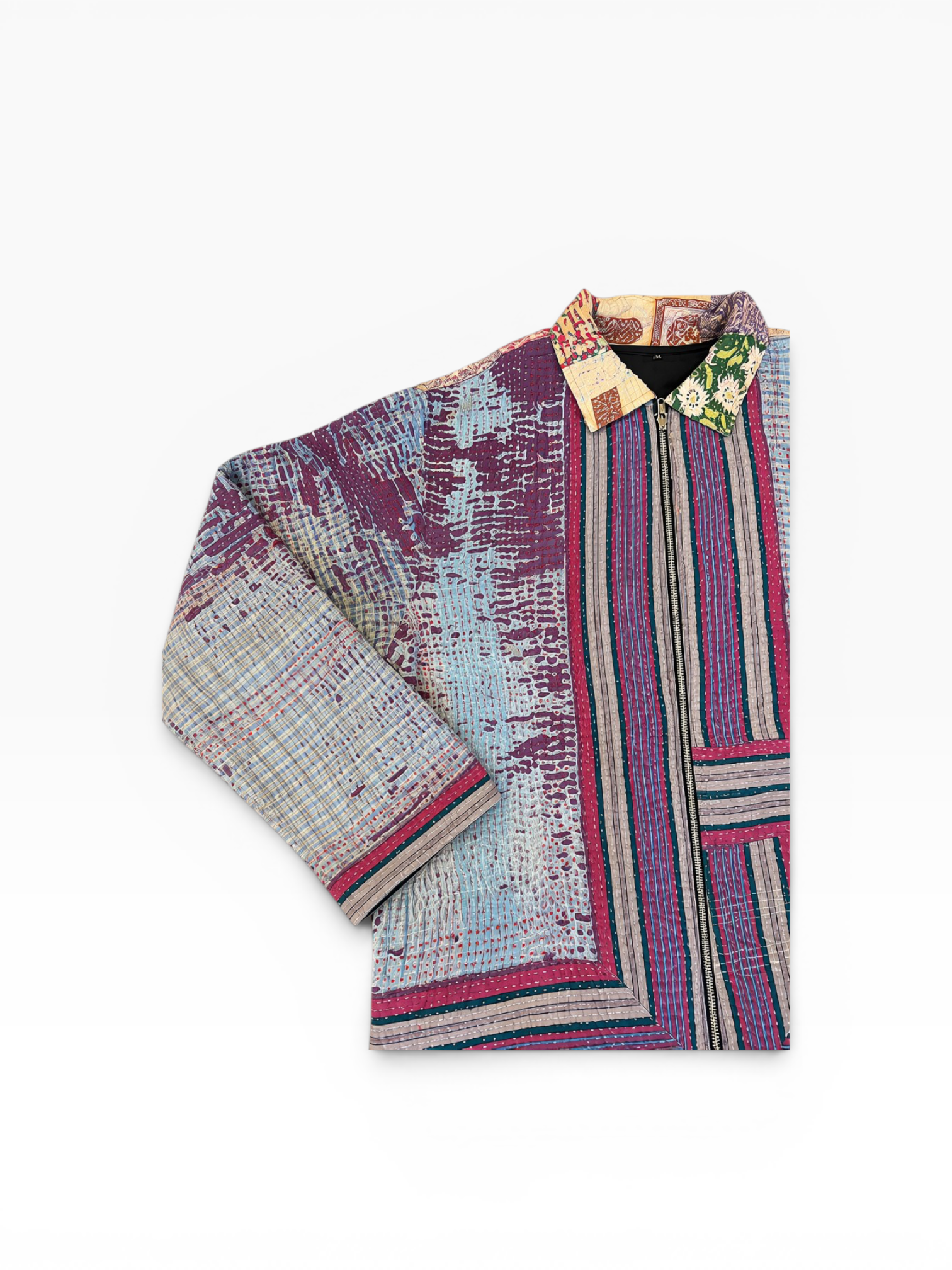 Folded fabric with multicolor pattern vintage kantha jacket on a white background