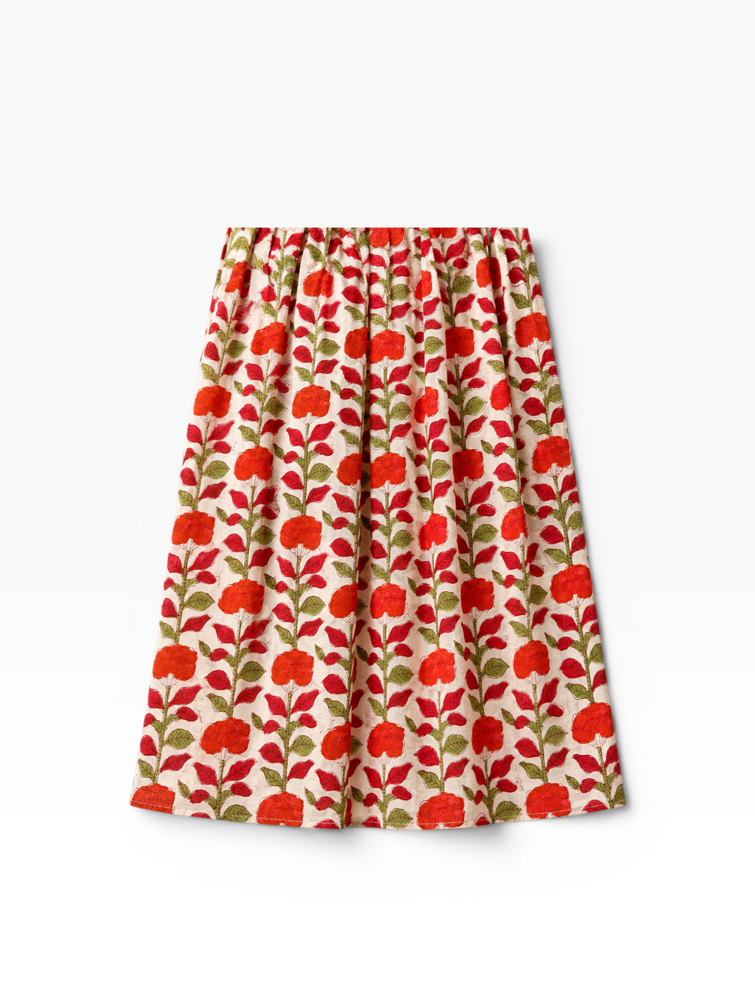 Lower half of a maxi dress with red floral hand block painted pattern on an off white cotton base.